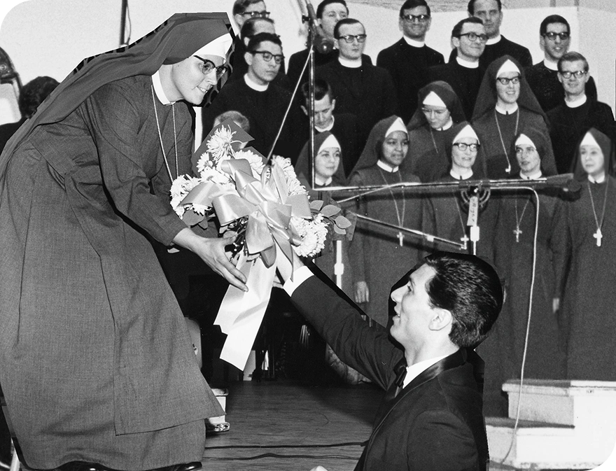 Sister receiving a bouquet of flowers